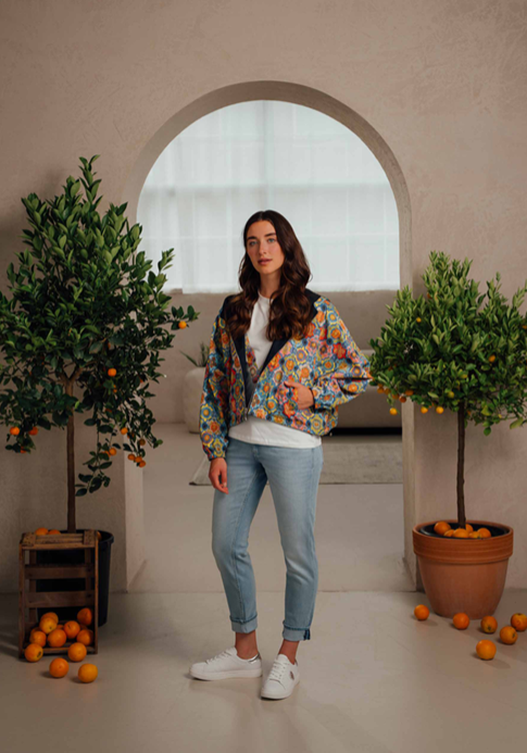 FEMALE JACKET, BLOUSE AND A JEAN TROUSER